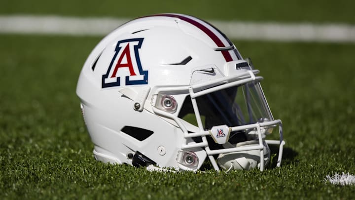 Nov 25, 2022; Tucson, Arizona, USA; Detailed view of an Arizona Wildcats helmet on the field during the Territorial Cup at Arizona Stadium. Mandatory Credit: Mark J. Rebilas-Imagn Images