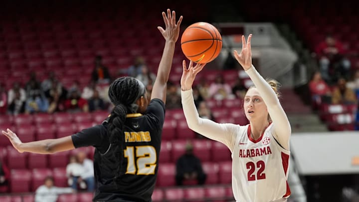 Dec. 1, 2025; Tuscaloosa, Alabama, USA; Alabama guard Karly Weathers (22) shoots a three over Kennesaw State guard Kaelyn Flowers (12) during the 5th Grade Fast Break day as Alabama faced Kennesaw State in Coleman Coliseum.