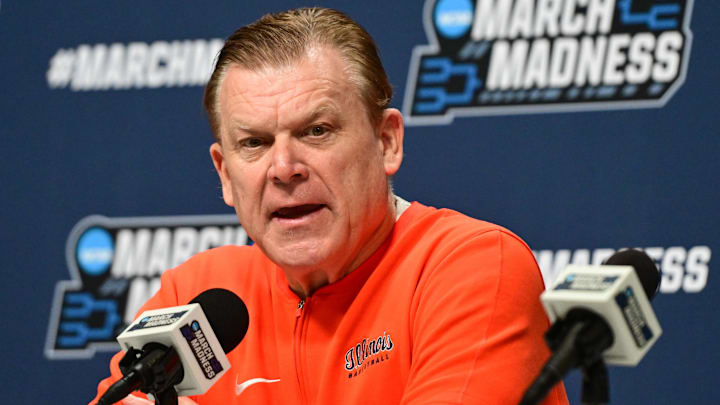 Mar 20, 2025; Milwaukee, WI, USA;  Illinois Fighting Illini head coach Brad Underwood speaks at press conference during NCAA Tournament First Round Practice at Fiserv Forum. Mandatory Credit: Benny Sieu-Imagn Images
