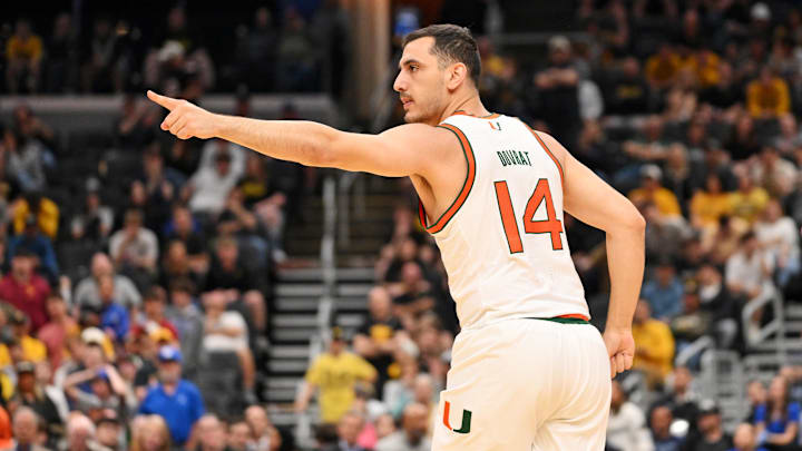 Mar 20, 2026; St. Louis, MO, USA; Miami (FL) Hurricanes guard Noam Dovrat (14) reacts after a play during the second half against the Missouri Tigers during a first round game of the men's 2026 NCAA Tournament at Enterprise Center. Mandatory Credit: Jeff Curry-Imagn Images Mar 20, 2026; St. Louis, MO, USA; Miami (FL) Hurricanes guard Noam Dovrat (14) reacts after a play during the second half against the Missouri Tigers during a first round game of the men's 2026 NCAA Tournament at Enterprise Center. Mandatory Credit: Jeff Curry-Imagn Images