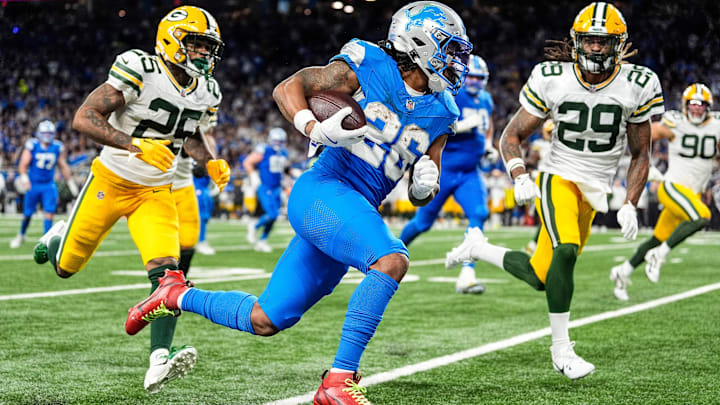 Detroit Lions running back Jahmyr Gibbs runs for a first down against Green Bay Packers safety Xavier McKinney (29) during the second half at Ford Field in Detroit on Thursday, Dec. 5, 2024. Detroit Lions running back Jahmyr Gibbs runs for a first down against Green Bay Packers safety Xavier McKinney (29) during the second half at Ford Field in Detroit on Thursday, Dec. 5, 2024.