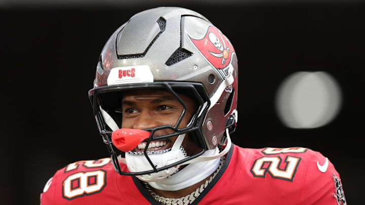 Aug 9, 2025; Tampa, Florida, USA; Tampa Bay Buccaneers safety Shilo Sanders (28) takes the field for warmups before a preseason game against the Tennessee Titans at Raymond James Stadium. Mandatory Credit: Nathan Ray Seebeck-Imagn Images