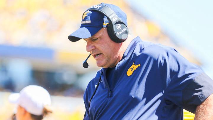 Aug 30, 2025; Morgantown, West Virginia, USA; West Virginia Mountaineers head coach Rich Rodriguez along the sidelines during the first quarter against the Robert Morris Colonials at Milan Puskar Stadium. Mandatory Credit: Ben Queen-Imagn Images Aug 30, 2025; Morgantown, West Virginia, USA; West Virginia Mountaineers head coach Rich Rodriguez along the sidelines during the first quarter against the Robert Morris Colonials at Milan Puskar Stadium. Mandatory Credit: Ben Queen-Imagn Images