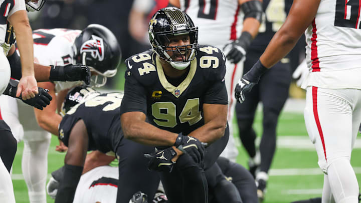 Nov 23, 2025; New Orleans, Louisiana, USA; New Orleans Saints defensive end Cameron Jordan (94) reacts after forcing a fumble against the Atlanta Falcons during the first half at Caesars Superdome. Mandatory Credit: Stephen Lew-Imagn Images