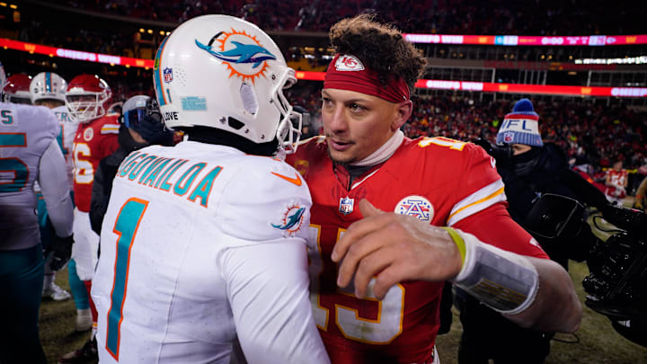 Kansas City Chiefs quarterback Patrick Mahomes (15) meets with Miami Dolphins quarterback Tua Tagovailoa (1) following the 2024 AFC wild card game at GEHA Field at Arrowhead Stadium. Kansas City Chiefs quarterback Patrick Mahomes (15) meets with Miami Dolphins quarterback Tua Tagovailoa (1) following the 2024 AFC wild card game at GEHA Field at Arrowhead Stadium.