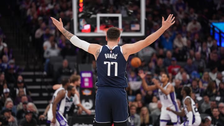 Mar 29, 2024; Sacramento, California, USA; Dallas Mavericks guard Luka Doncic (77) raises his arms Mar 29, 2024; Sacramento, California, USA; Dallas Mavericks guard Luka Doncic (77) raises his arms