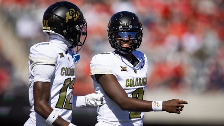 Colorado Buffalos quarterback Shedeur Sanders (2) with wide receiver Travis Hunter (12) against the Arizona Wildcats at Arizona Stadium.