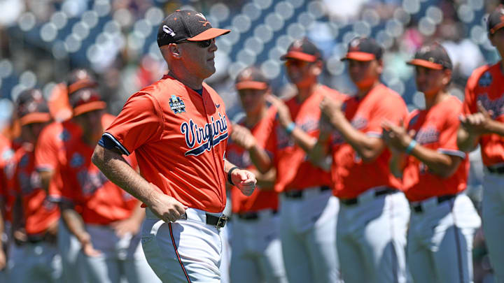 Virginia Cavalier head coach Brian O'Connor takes the field before the game against the North Carolina Tar Heels at Charles Schwab Filed Omaha. Virginia Cavalier head coach Brian O'Connor takes the field before the game against the North Carolina Tar Heels at Charles Schwab Filed Omaha.