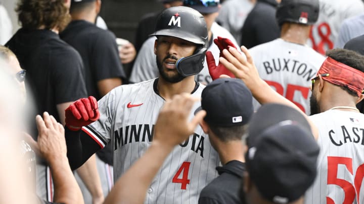 Jul 10, 2024; Chicago, Illinois, USA; Minnesota Twins shortstop Carlos Correa (4) celebrates in the dugout after hitting a home run against the Chicago White Sox during the sixth inning at Guaranteed Rate Field. Mandatory Credit: Matt Marton-USA TODAY Sports Jul 10, 2024; Chicago, Illinois, USA; Minnesota Twins shortstop Carlos Correa (4) celebrates in the dugout after hitting a home run against the Chicago White Sox during the sixth inning at Guaranteed Rate Field. Mandatory Credit: Matt Marton-USA TODAY Sports