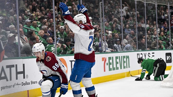 Apr 4, 2026; Dallas, Texas, USA; Colorado Avalanche center Martin Necas (88) and center Nathan MacKinnon (29) celebrate after Necas scores the game winning goal against the Dallas Stars during the third period at the American Airlines Center. Mandatory Credit: Jerome Miron-Imagn Images
