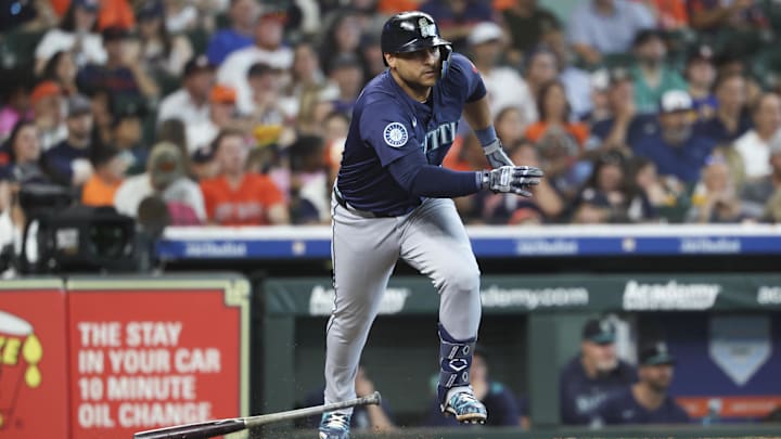 Seattle Mariners infielder Donovan Solano hits a single during a game against the Houston Astros on May 24 at Daikin Park.