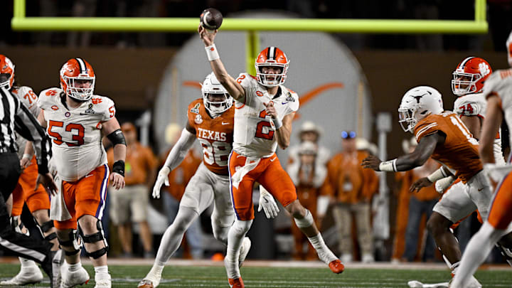 Dec 21, 2024; Austin, Texas, USA; Clemson Tigers quarterback Cade Klubnik (2) passes the ball for a first down against the Texas Longhorns during the second half of the CFP National Playoff first round game at Darrell K Royal-Texas Memorial Stadium. Dec 21, 2024; Austin, Texas, USA; Clemson Tigers quarterback Cade Klubnik (2) passes the ball for a first down against the Texas Longhorns during the second half of the CFP National Playoff first round game at Darrell K Royal-Texas Memorial Stadium.