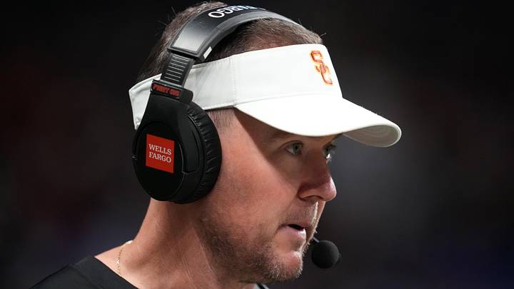 Dec 30, 2025; San Antonio, TX, USA; Southern California Trojans head coach Lincoln Riley watches in the first half against the TCU Horned Frogs during the Alamo Bowl at Alamodome. Mandatory Credit: Kirby Lee-Imagn Images Dec 30, 2025; San Antonio, TX, USA; Southern California Trojans head coach Lincoln Riley watches in the first half against the TCU Horned Frogs during the Alamo Bowl at Alamodome. Mandatory Credit: Kirby Lee-Imagn Images