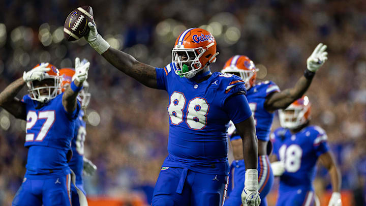 Nov 16, 2024; Gainesville, Florida, USA; Florida Gators defensive lineman Caleb Banks (88) celebrates with the ball after a fumble recovery against the LSU Tigers during the second half at Ben Hill Griffin Stadium. Mandatory Credit: Matt Pendleton-Imagn Images Nov 16, 2024; Gainesville, Florida, USA; Florida Gators defensive lineman Caleb Banks (88) celebrates with the ball after a fumble recovery against the LSU Tigers during the second half at Ben Hill Griffin Stadium. Mandatory Credit: Matt Pendleton-Imagn Images