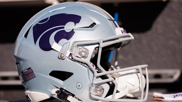 Nov 15, 2025; Stillwater, Oklahoma, USA; Kansas State Wildcats helmet on the side lines prior to the game against the Oklahoma State Cowboys at Boone Pickens Stadium. 
