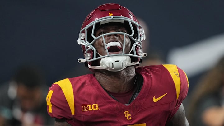 Sep 1, 2024; Paradise, Nevada, USA; Southern California Trojans running back Woody Marks (4) celebrates after scoring on a 13-yard touchdown run with eight seconds left against the LSU Tigers at Allegiant Stadium. Mandatory Credit: Kirby Lee-Imagn Images