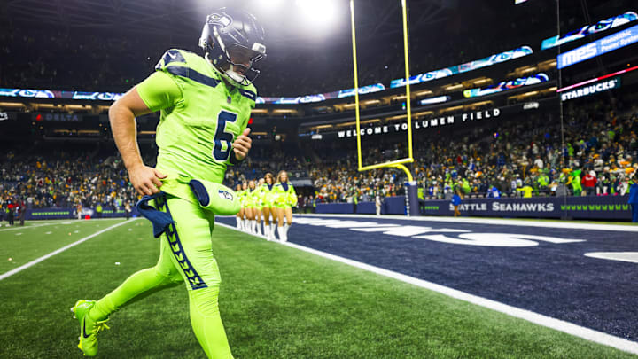 Dec 15, 2024; Seattle, Washington, USA; Seattle Seahawks quarterback Sam Howell (6) jogs to the locker room following a loss against the Green Bay Packers at Lumen Field. Mandatory Credit: Joe Nicholson-Imagn Images Dec 15, 2024; Seattle, Washington, USA; Seattle Seahawks quarterback Sam Howell (6) jogs to the locker room following a loss against the Green Bay Packers at Lumen Field. Mandatory Credit: Joe Nicholson-Imagn Images
