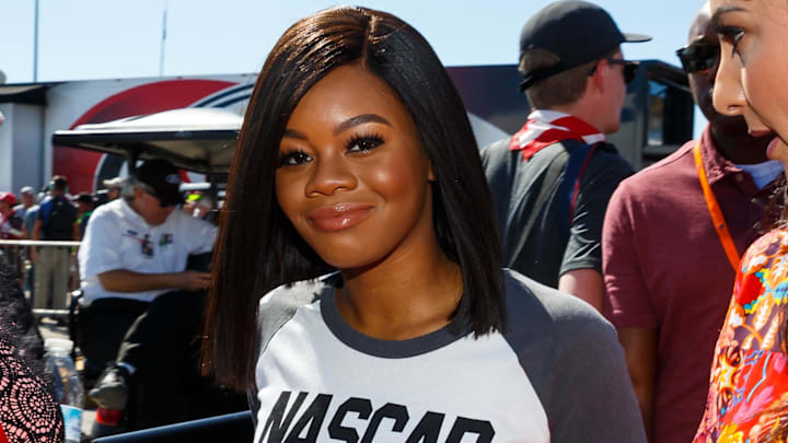 USA olympic gymnast Gabby Douglas before the Ford EcoBoost 400 at Homestead-Miami Speedway back in 2017 USA olympic gymnast Gabby Douglas before the Ford EcoBoost 400 at Homestead-Miami Speedway back in 2017