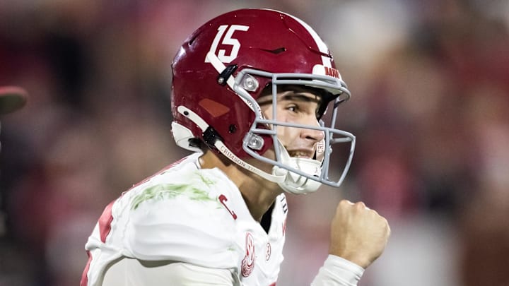 Dec 19, 2025; Norman, OK, USA; Alabama Crimson Tide quarterback Ty Simpson (15) celebrates against the Oklahoma Sooners during the CFP National Playoff First Round at Gaylord Family Oklahoma Memorial Stadium. Mandatory Credit: Mark J. Rebilas-Imagn Images
