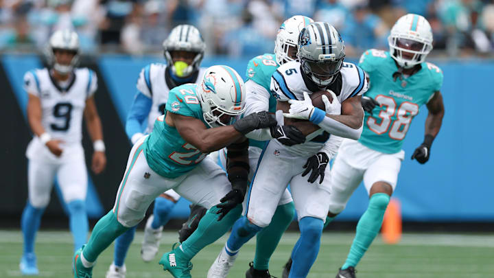 Oct 5, 2025; Charlotte, North Carolina, USA; Carolina Panthers running back Rico Dowdle (5) carries the ball during the second quarter against the Miami Dolphins at Bank of America Stadium. Mandatory Credit: Cory Knowlton-Imagn Images Oct 5, 2025; Charlotte, North Carolina, USA; Carolina Panthers running back Rico Dowdle (5) carries the ball during the second quarter against the Miami Dolphins at Bank of America Stadium. Mandatory Credit: Cory Knowlton-Imagn Images