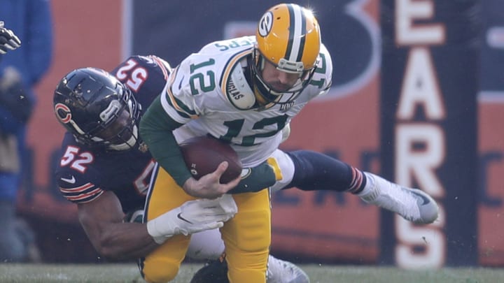 Khalil Mack wraps up Aaron Rodgers for a sack in the Bears' division-clinching win during the 2018 season.