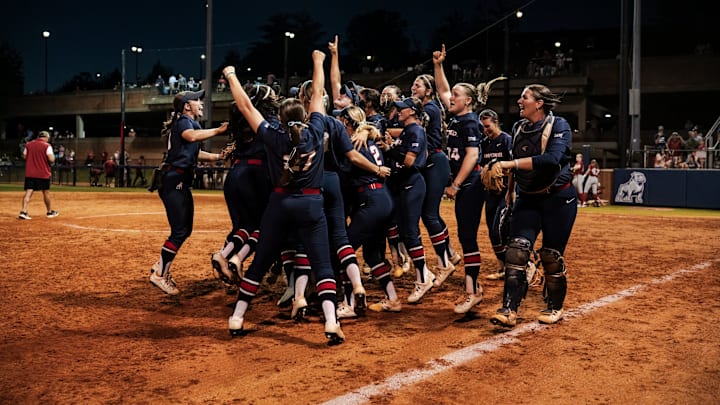 Samford softball team celebrates victory over Alabama