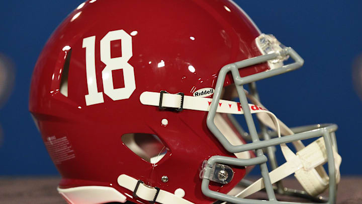 An Alabama football helmet is displayed