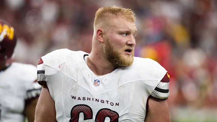 Tyler Biadasz walks off the field.