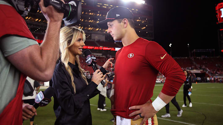 Sep 9, 2024; Santa Clara, California, USA; San Francisco 49ers quarterback Brock Purdy (13) talks with Monday Night Football's Laura Rutledge after the win against the New York Jets at Levi's Stadium. Mandatory Credit: David Gonzales-Imagn Images