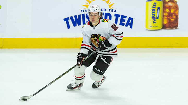 Apr 15, 2025; Ottawa, Ontario, CAN; Chicago Blackhawks center Connor Bedard (98) skates with the puck in the third period against the Ottawa Senators at the Canadian Tire Centre. Mandatory Credit: Marc DesRosiers-Imagn Images