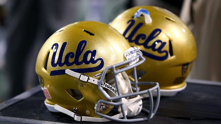 Sep 25, 2014; Tempe, AZ, USA; Detailed view of UCLA Bruins helmets on the sidelines against the Arizona State Sun Devils at Sun Devil Stadium. Mandatory Credit: Mark J. Rebilas-Imagn Images