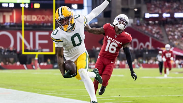 Oct 19, 2025; Glendale, Arizona, USA; Green Bay Packers wide receiver Matthew Golden (0) is pushed out of bounds by Arizona Cardinals cornerback Max Melton (16) in the second half at State Farm Stadium. Mandatory Credit: Mark J. Rebilas-Imagn Images Oct 19, 2025; Glendale, Arizona, USA; Green Bay Packers wide receiver Matthew Golden (0) is pushed out of bounds by Arizona Cardinals cornerback Max Melton (16) in the second half at State Farm Stadium. Mandatory Credit: Mark J. Rebilas-Imagn Images