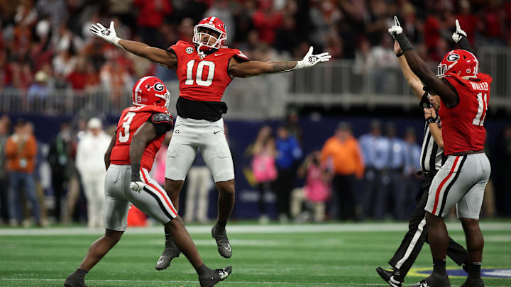 Dec 7, 2024; Atlanta, GA, USA; Georgia Bulldogs linebacker Damon Wilson II (10), linebacker Jalon Walker (11) and linebacker CJ Allen (3) react during the second half in the 2024 SEC Championship game at Mercedes-Benz Stadium. Mandatory Credit: Brett Davis-Imagn Images
