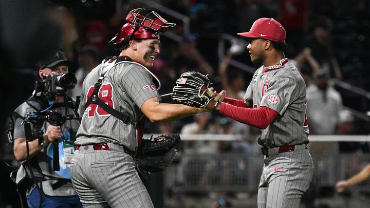Jun 17, 2026; Omaha, NE, USA; Oklahoma Sooners pitcher LJ Mercurius (22) and catcher Deiten Lachance (48) celebrate the win against the Georgia Bulldogs at Charles Schwab Field. Mandatory Credit: Steven Branscombe-Imagn Images Jun 17, 2026; Omaha, NE, USA; Oklahoma Sooners pitcher LJ Mercurius (22) and catcher Deiten Lachance (48) celebrate the win against the Georgia Bulldogs at Charles Schwab Field. Mandatory Credit: Steven Branscombe-Imagn Images