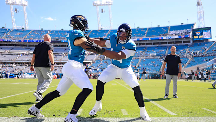 Jacksonville Jaguars linebacker Travon Walker (44) drills with linebacker Josh Allen (41) before an NFL football matchup Sunday, Oct. 15, 2023 at EverBank Stadium in Jacksonville, Fla.