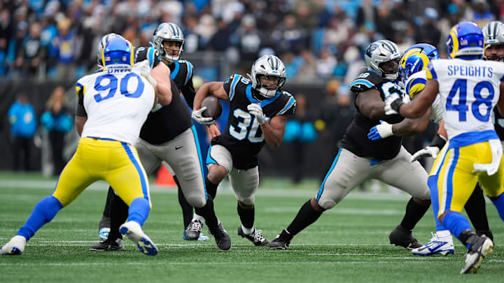 Nov 30, 2025; Charlotte, North Carolina, USA; Carolina Panthers running back Chuba Hubbard (30) rushes during the second quarter against the Los Angeles Rams at Bank of America Stadium. Mandatory Credit: Jim Dedmon-Imagn Images Nov 30, 2025; Charlotte, North Carolina, USA; Carolina Panthers running back Chuba Hubbard (30) rushes during the second quarter against the Los Angeles Rams at Bank of America Stadium. Mandatory Credit: Jim Dedmon-Imagn Images