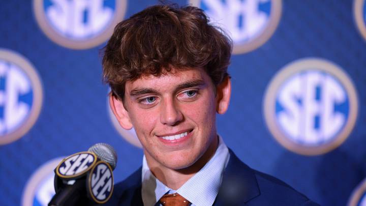 Texas Longhorns quarterback Arch Manning (16) speaks to the press during SEC Football Kickoff Media Day at the Tampa Marriott. Texas Longhorns quarterback Arch Manning (16) speaks to the press during SEC Football Kickoff Media Day at the Tampa Marriott.