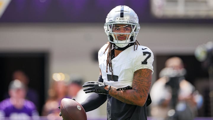Aug 10, 2024; Minneapolis, Minnesota, USA; Las Vegas Raiders safety Tre'von Moehrig (7) warms up before the game against the Minnesota Vikings  at U.S. Bank Stadium. Mandatory Credit: Brad Rempel-Imagn Images
