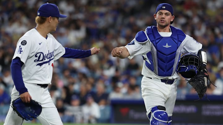 Sep 18, 2025; Los Angeles, California, USA; Los Angeles Dodgers pitcher Yoshinobu Yamamoto (18) and catcher Ben Rortvedt (47) react after the second inning against the San Francisco Giants at Dodger Stadium. Mandatory Credit: Kiyoshi Mio-Imagn Images Sep 18, 2025; Los Angeles, California, USA; Los Angeles Dodgers pitcher Yoshinobu Yamamoto (18) and catcher Ben Rortvedt (47) react after the second inning against the San Francisco Giants at Dodger Stadium. Mandatory Credit: Kiyoshi Mio-Imagn Images