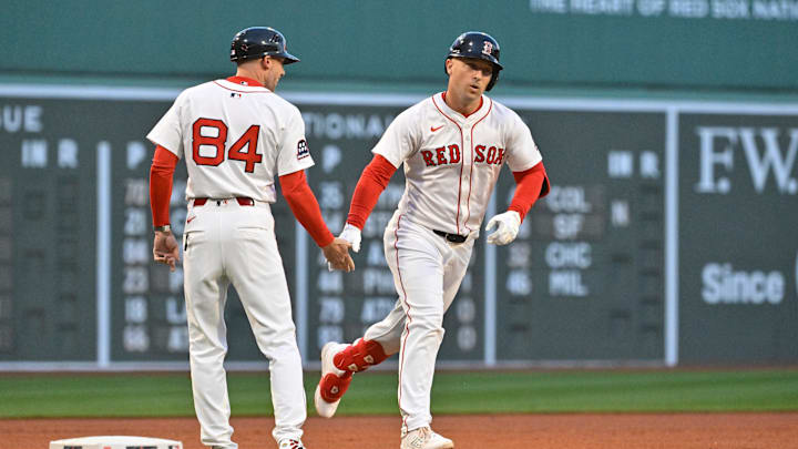 May 2, 2025; Boston, Massachusetts, USA; Boston Red Sox third baseman Alex Bregman (2) celebrates his home run against the Minnesota Twins with third base coach/outfield instructor Kyle Hudson (84) during the first inning at Fenway Park. Mandatory Credit: Eric Canha-Imagn Images May 2, 2025; Boston, Massachusetts, USA; Boston Red Sox third baseman Alex Bregman (2) celebrates his home run against the Minnesota Twins with third base coach/outfield instructor Kyle Hudson (84) during the first inning at Fenway Park. Mandatory Credit: Eric Canha-Imagn Images