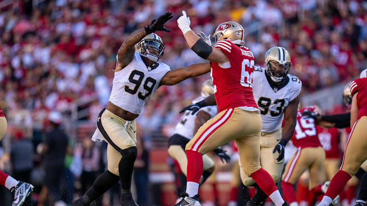 New Orleans Saints defensive end Chase Young (99) rushes against San Francisco 49ers guard Jarrett Kingston (62) during the second quarter at Levi's Stadium.