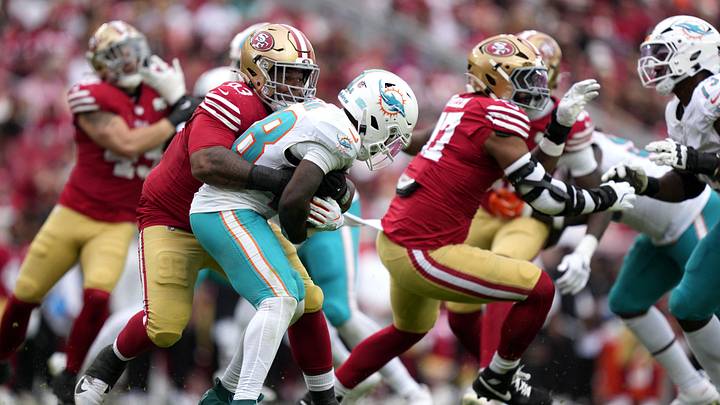 Sep 20, 2026; Santa Clara, California, USA; San Francisco 49ers defensive tackle Gracen Halton (93) tackles Miami Dolphins running back De'Von Achane (28) in the fourth quarter at Levi's Stadium.c=. Mandatory Credit: Kyle Terada-Imagn Images Sep 20, 2026; Santa Clara, California, USA; San Francisco 49ers defensive tackle Gracen Halton (93) tackles Miami Dolphins running back De'Von Achane (28) in the fourth quarter at Levi's Stadium.c=. Mandatory Credit: Kyle Terada-Imagn Images
