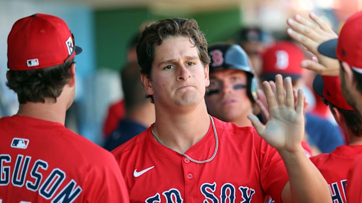 Boston Red Sox outfielder Roman Anthony (48) is congratulated after he scored a run against the Philadelphia Phillies during the third inning at BayCare Ballpark. Boston Red Sox outfielder Roman Anthony (48) is congratulated after he scored a run against the Philadelphia Phillies during the third inning at BayCare Ballpark.