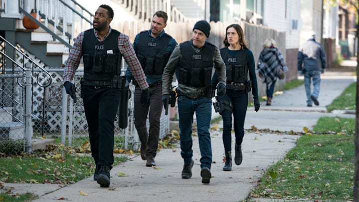 CHICAGO P.D. -- "Confidential" Episode 511 -- Pictured: (l-r) LaRoyce Hawkins as Kevin Atwater, Patrick John Flueger as Adam Ruzek, Jon Seda as Antonio Dawson, Marina Squerciati as Kim Burgess -- (Photo by: Matt Dinerstein/NBC)