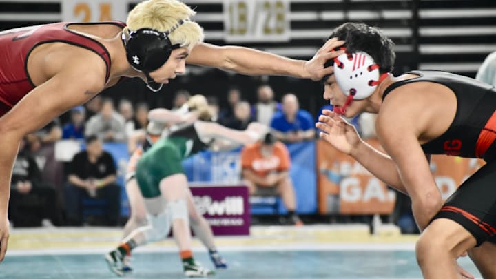 Toppenish and Orting went head to head for the Class 2A wrestling championship - and in this 126-pound finals match between Isaiah Rios, left, and Ty Satiacum Jr.