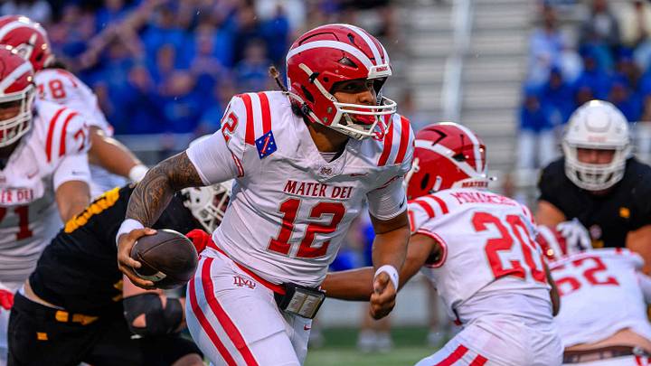 Mater Dei QB Russell Sekona runs against Orem High of Utah in an out-of-state battle in late August. Mater Dei QB Russell Sekona runs against Orem High of Utah in an out-of-state battle in late August.
