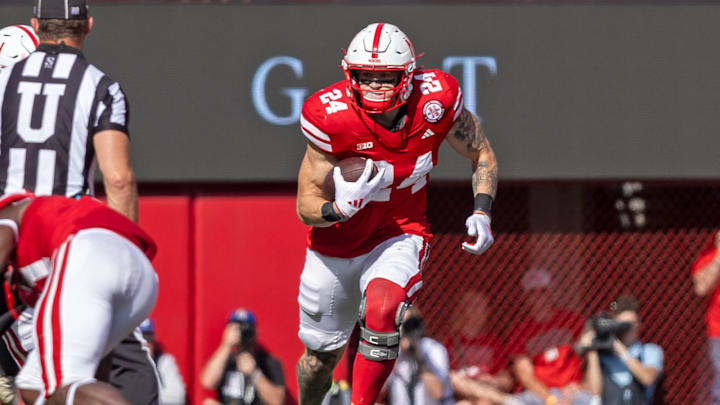 Nebraska tight end Thomas Fidone turns up field after catching a short pass against Rutgers.
