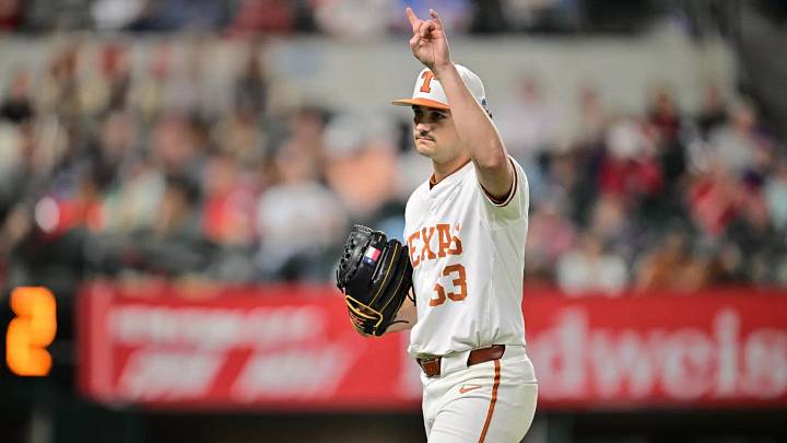 Texas Longhhorns graduate pitcher Luke Harrison throws the "Horns Up" after a start Texas Longhhorns graduate pitcher Luke Harrison throws the "Horns Up" after a start