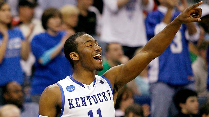 Mar 20, 2010; New Orleans, LA, USA; Kentucky Wildcats guard John Wall (11) celebrates a basket by a teammate against the Wake Forest Demon Deacons during the second half in the second round of the 2010 NCAA mens basketball tournament at the New Orleans Arena. Kentucky defeated Wake Forest 90-60. Mandatory Credit: Crystal LoGiudice-USA TODAY Sports Mar 20, 2010; New Orleans, LA, USA; Kentucky Wildcats guard John Wall (11) celebrates a basket by a teammate against the Wake Forest Demon Deacons during the second half in the second round of the 2010 NCAA mens basketball tournament at the New Orleans Arena. Kentucky defeated Wake Forest 90-60. Mandatory Credit: Crystal LoGiudice-USA TODAY Sports