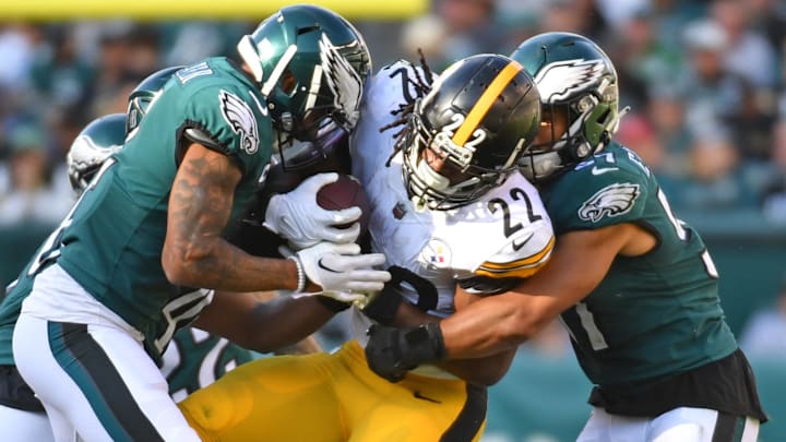 Oct 30, 2022; Philadelphia, Pennsylvania, USA; Pittsburgh Steelers running back Najee Harris (22) is tackled by Philadelphia Eagles linebacker Haason Reddick (7) and linebacker T.J. Edwards (57) during the third quarter at Lincoln Financial Field. Mandatory Credit: Eric Hartline-Imagn Images